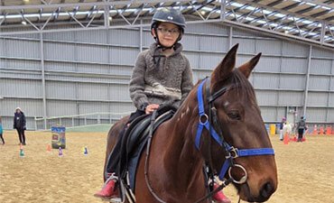 Rocket and rider, in the arena
