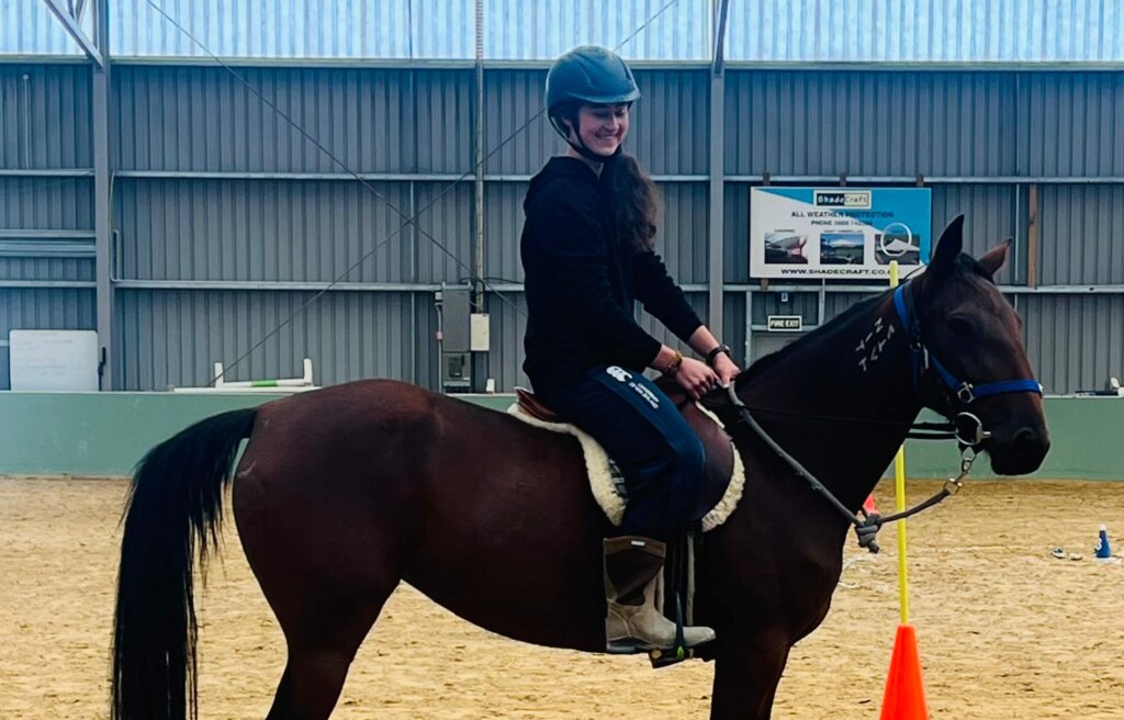 Rocket, now called Kit, riding in the arena